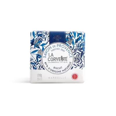 Sabonete embalado decorado com padrão azul e branco e texto em francês