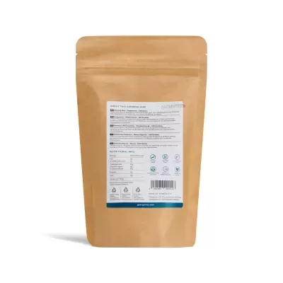 Embalagem castanha clara com rótulo branco na parte traseira, texto e códigos de barras.