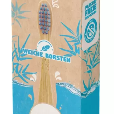 Embalagem de escova de dentes infantil Dental Delight em bambu com panda e textos sobre cerdas macias e sustentabilidade.