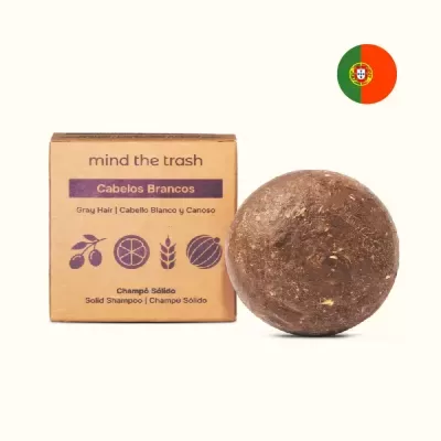 Champô sólido para cabelos brancos com embalagem castanha e barra marrom.