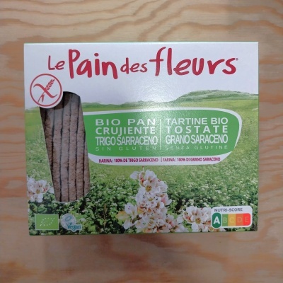 Embalagem de pão crocante orgânico Le Pain des Fleurs com rótulo verde, branco e imagem de flores