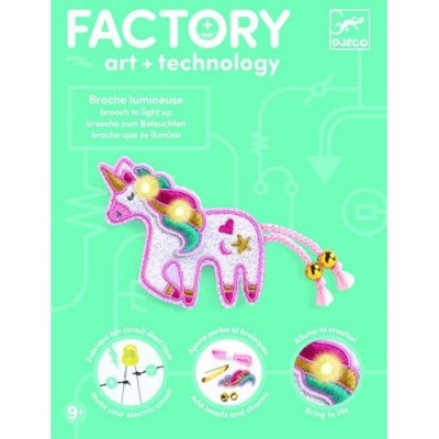 Broche de unicórnio com luzes LED acesas em embalagem verde