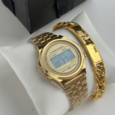 Relógio digital dourado e pulseira dourada gravada em almofada branca