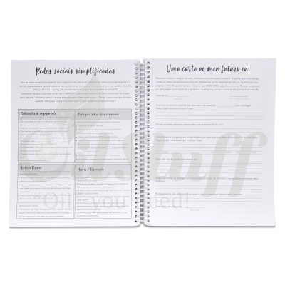 Caderno espiral aberto com texto impresso em português