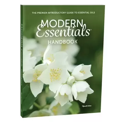 Livro Modern Essentials Handbook com capa verde e flores brancas
