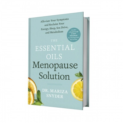 Livro The Essential Oils Menopause Solution com capa azul clara, limões e folhas verdes