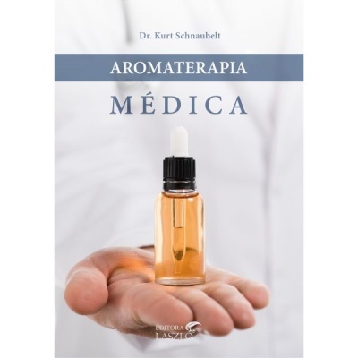 Livro Aromaterapia Médica com frasco de líquido âmbar numa mão
