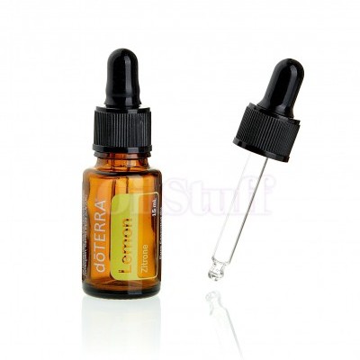 Frasco pequeno âmbar com conta-gotas preto e rótulo amarelo de óleo essencial de limão