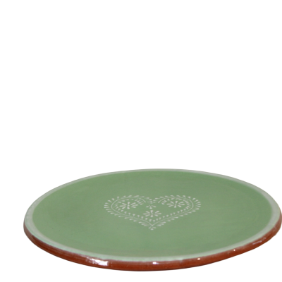 Prato verde em cerâmica com padrão decorativo branco em forma de coração