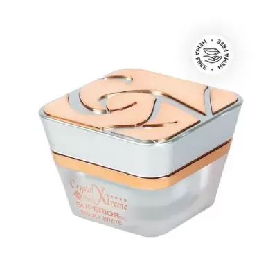 Frasco de creme prateado com detalhes dourados rosa e texto Crystal Nail Xtreme Superior Milky White