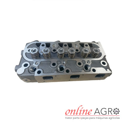 Cabeça de cilindro metálica cinza para motor, com molas, em fundo branco e logotipo online AGRO no canto inferior direito.