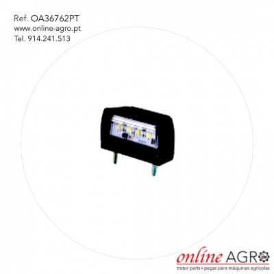 Peça eletrónica preta com pernas metálicas e texto de referência e contacto