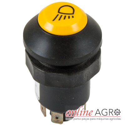 Interruptor redondo preto e amarelo com símbolo de farol