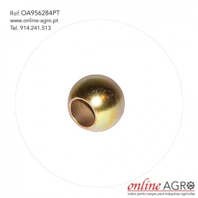 Esfera metálica dourada com orifício central sobre fundo branco e texto em volta