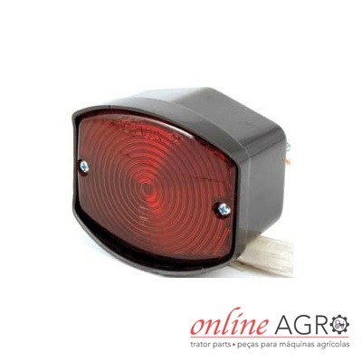 Luz traseira vermelha com estrutura preta para máquina agrícola