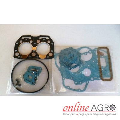 Conjunto de juntas para motor com várias peças plásticas e metálicas, embaladas em plástico, sobre fundo branco.
