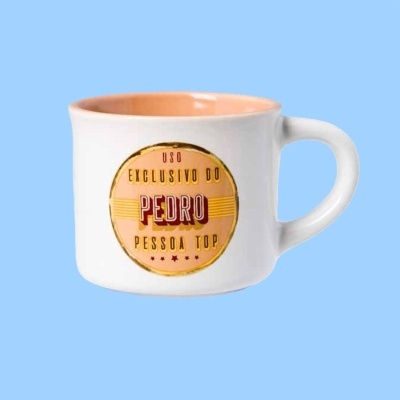 Caneca branca com interior laranja e texto personalizado