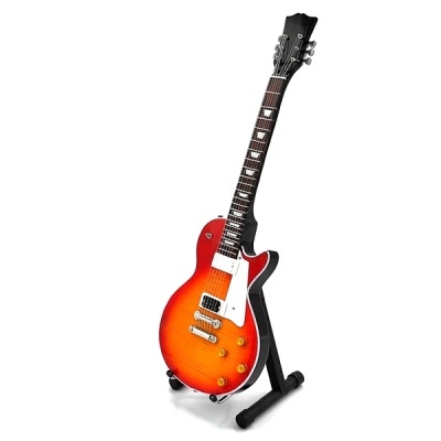 Guitarra elétrica vermelha e alaranjada em suporte preto