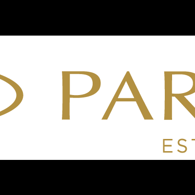 Logótipo dourado da marca Parker com texto e símbolo