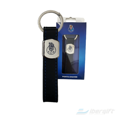 Porta-chaves FC Porto em metal e couro sintético preto com embalagem azul.
