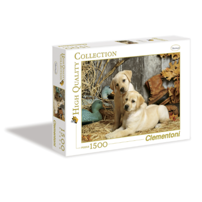 Caixa de quebra-cabeças Clementoni com imagem de dois cães labradores amarelos em cenário rústico