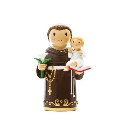 Figura de cerâmica de santo com criança e lírio