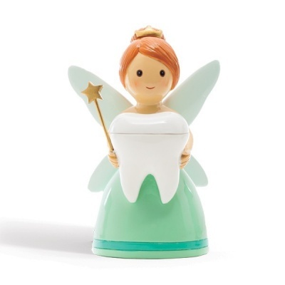 Figura de fada da dentição com vestido verde e dente branco