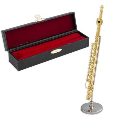 flauta dourada com suporte e estojo preto com interior vermelho
