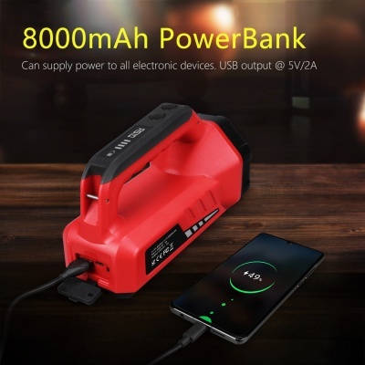 PowerBank vermelho 8000mAh a carregar telemóvel em mesa de madeira