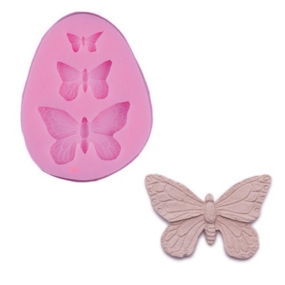 Forma de silicone rosa com cavidades de borboleta e borboleta decorativa bege