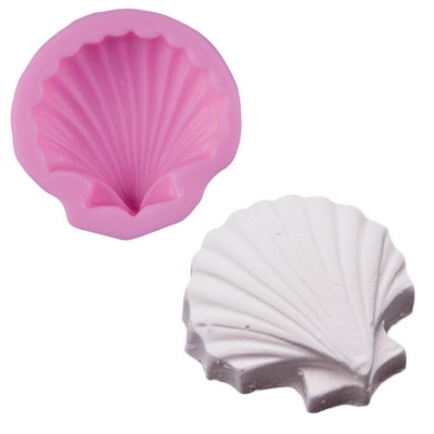 Forma silicone rosa em forma de concha e figura branca de concha moldada
