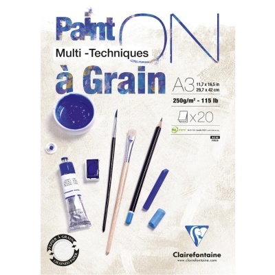 Bloco de papel Clairefontaine A3 multi-técnicas com material de pintura azul e roxo.