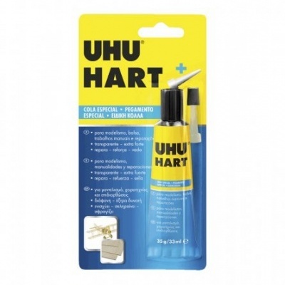 Cola especial UHU HART em embalagem azul e amarela com tubo e aplicador