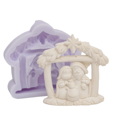 Molde de silicone lilás com figura de presépio em gesso branco