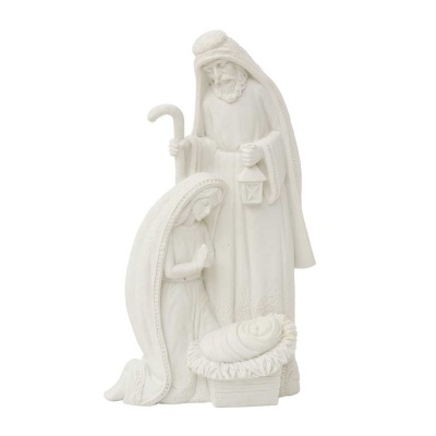 Estatueta branca da cena do presépio com Maria, José e o menino Jesus.
