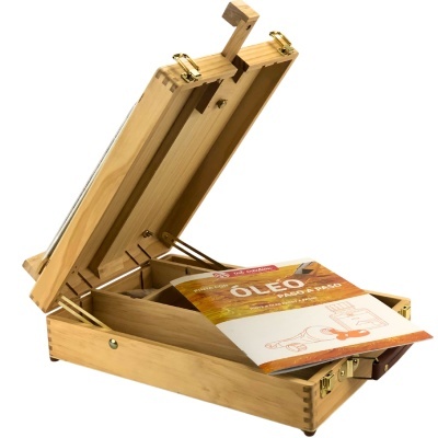 Estojo de madeira claro aberto com livro de pintura a óleo e compartimentos