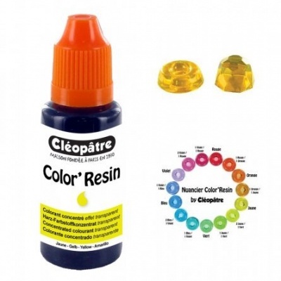 Frasco de corante Cléopâtre Color' Resin amarelo com tampa laranja e amostras de resina