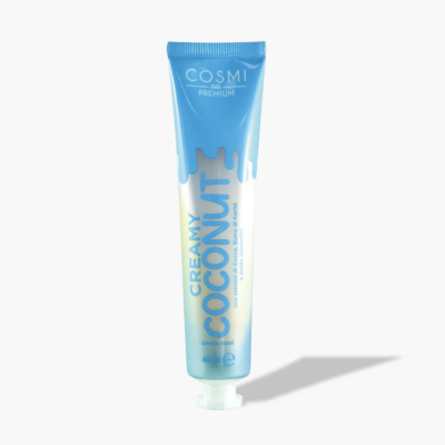 Tubo de creme azul e branco com texto 'COSMI PREMIUM' e 'CREAMY COCONUT'
