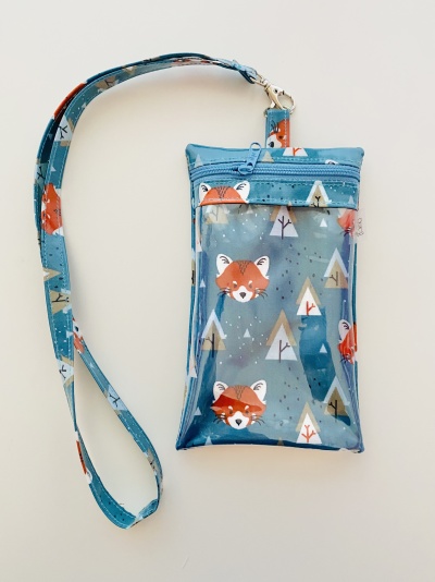 Bolsa azul com estampado de raposas e árvores, com alça e compartimento transparente