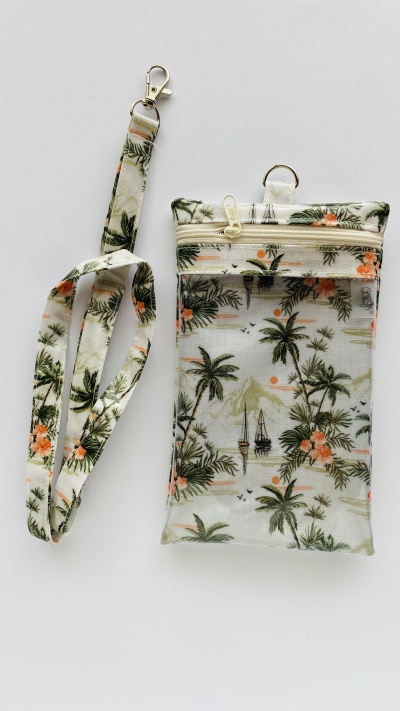 Bolsa pequena com padrão tropical de palmeiras e flores laranja com fecho zip e alça destacável