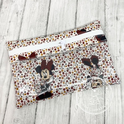 Bolsa de mão estampada com Minnie Mouse e padrão floral pequeno