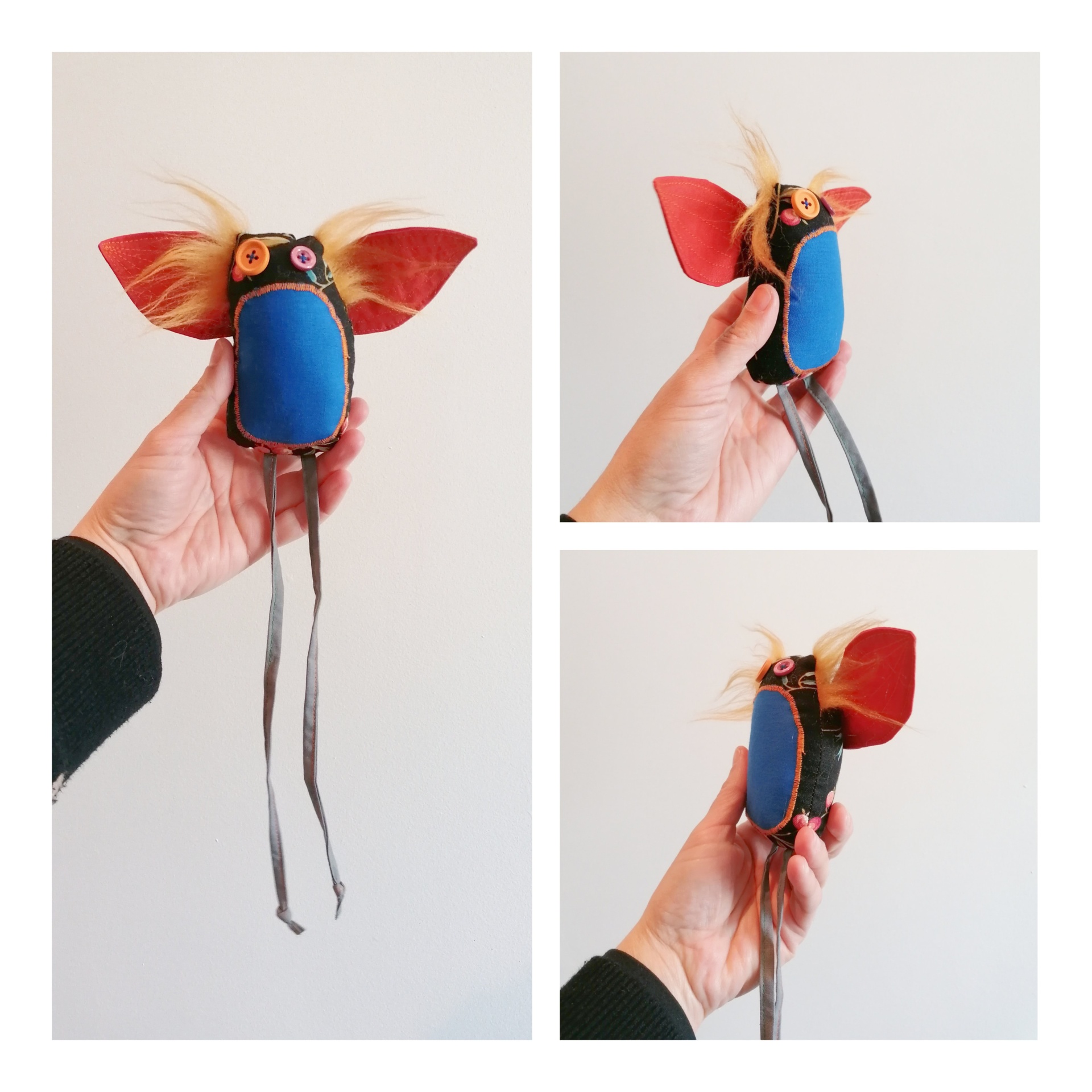 Passatortos! Morcego artesanal azul e vermelho com olhos coloridos e tiras cinzentas