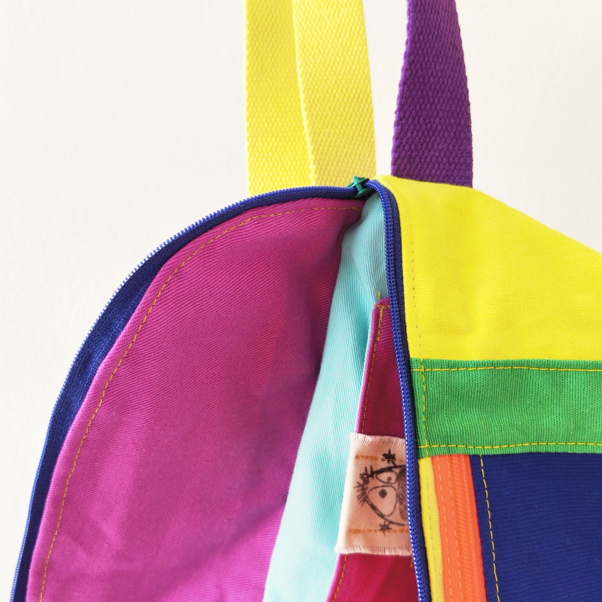 Bolsas de cintura Color Block! Mochila colorida em tecido com fecho zip e alças amarelas e roxas
