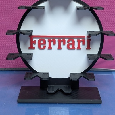 Suporte circular para relógios com logo Ferrari em relevo vermelho