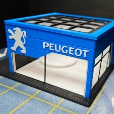 Miniatura do edifício da Peugeot azul com logotipo de leão e texto PEUGEOT