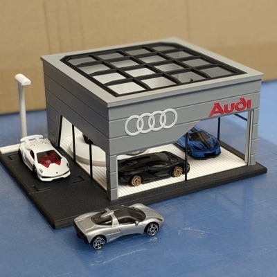 Miniatura de garagem Audi com carros desportivos em miniatura