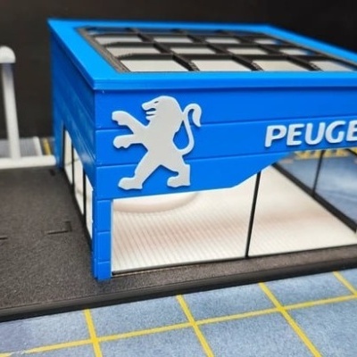 Modelo miniatura de garagem Peugeot azul com base preta