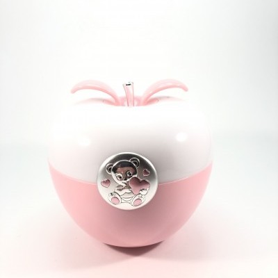 Frasco de perfume em forma de maçã branco e rosa com emblema de ursinho