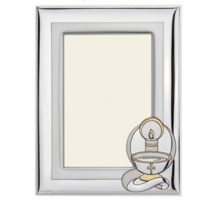 Moldura de foto prateada com decoração de vela acesa