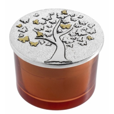 Recipiente de vidro âmbar com tampa metálica decorada com árvore prateada e folhas douradas
